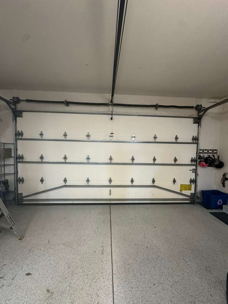 Garage door sensor repair