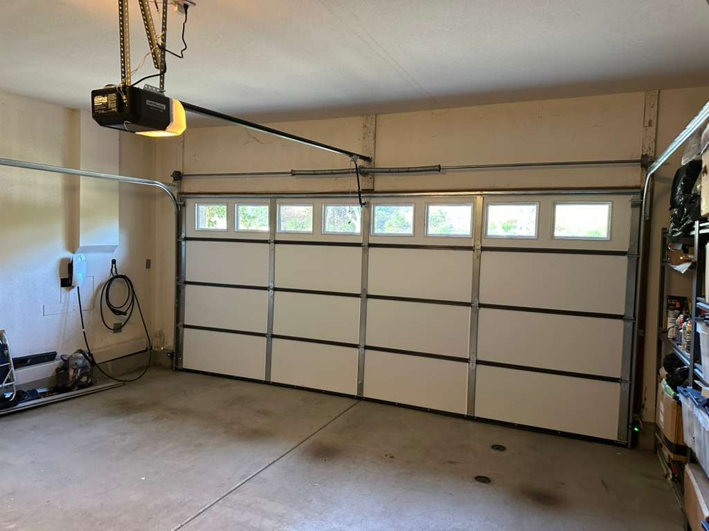 White double garage door interior with windows