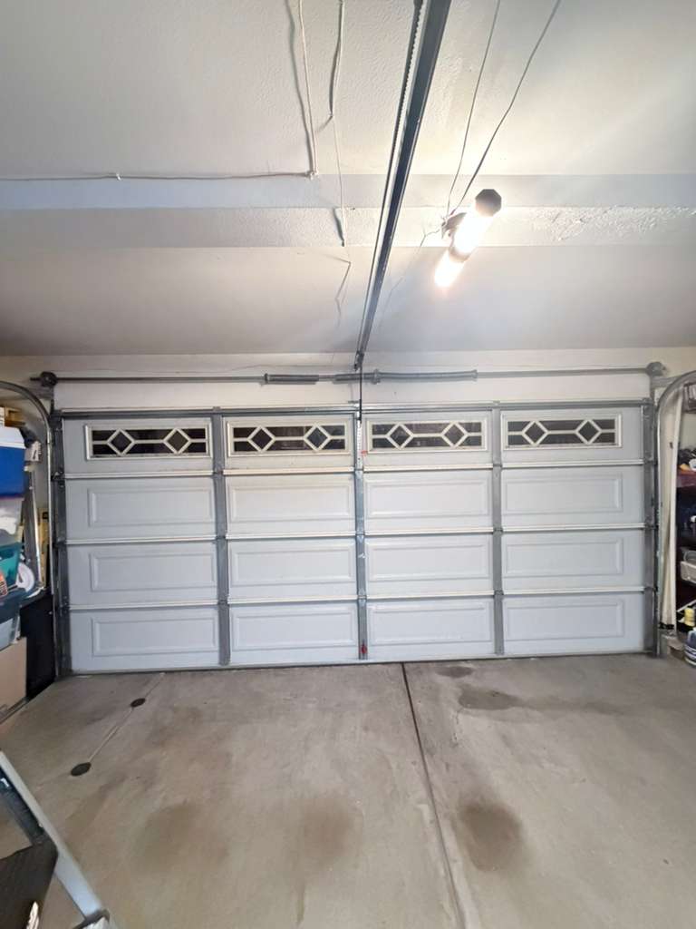 Sectional door with diamond windows