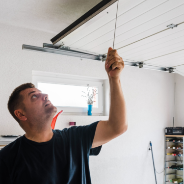 San Diego Garage Door Technician servicing a residential customer in san diego
